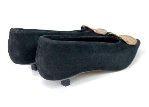 Elegant women's black suede shoes with low heel.